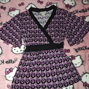 Stylish woman's babydoll top in purple and Black